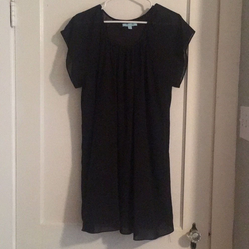 Black shift dress with flutter sleeves